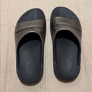 Oofos - Black and Metallic Slide Sandals